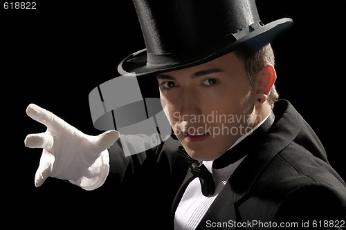 Image of young magician with high hat 