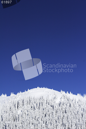 Image of blue sky over mountain top