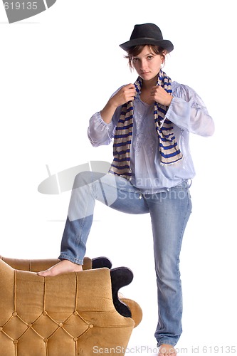 Image of young woman in hat and striped scarf
