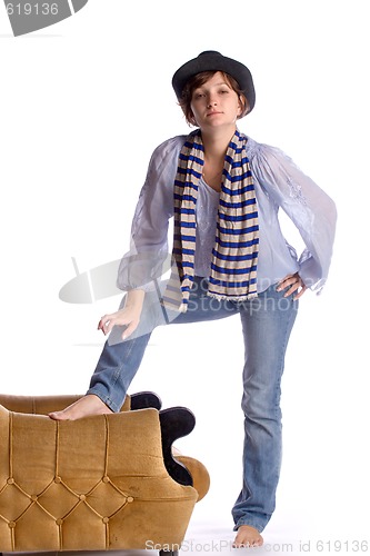 Image of young woman in hat and striped scarf