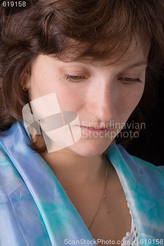 Image of woman in blue headscarf