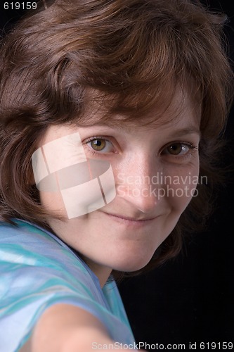 Image of woman in blue headscarf