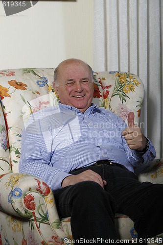 Image of happy senior at home