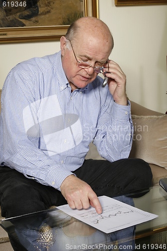 Image of senior at home on the phone