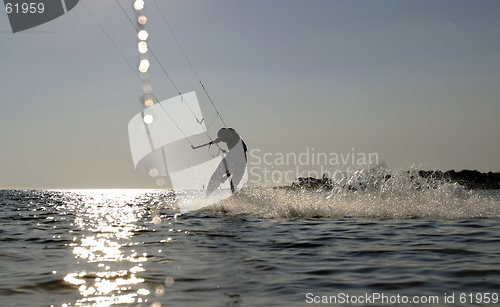 Image of kite boarder surfing at speed