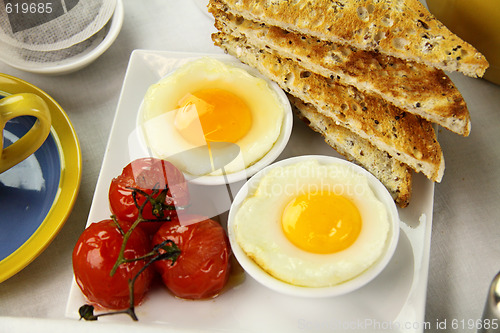 Image of Poached Eggs And Tomatoes