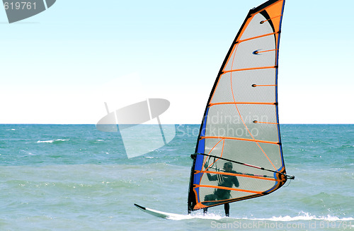 Image of Windsurfer on the sea in the afternoon