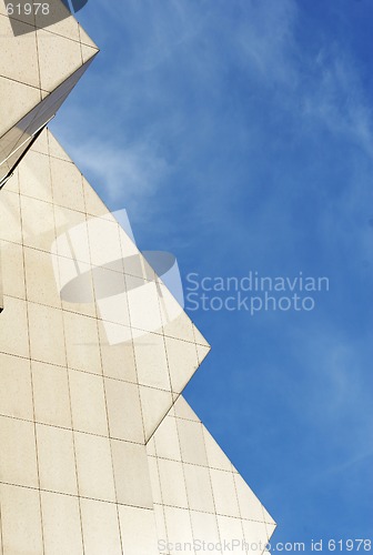 Image of detail of office building with blue sky