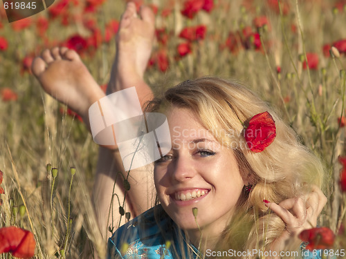 Image of Barefoot blonde in poppies