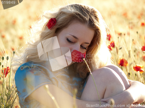 Image of Blonde in poppies