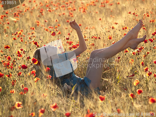 Image of Barefoot blonde in poppies