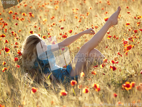 Image of Barefoot blonde in poppies