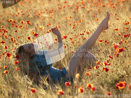 Image of Barefoot blonde in poppies