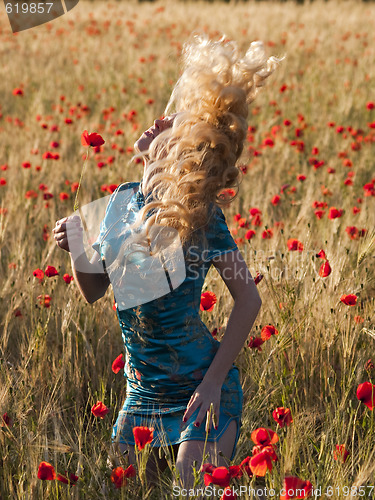 Image of Blonde in poppy field