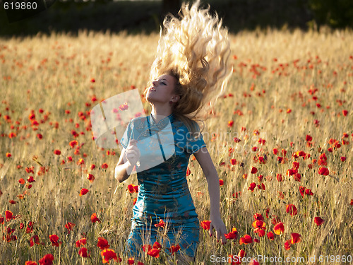 Image of Blonde in poppy field