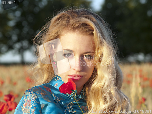 Image of Blonde with poppy