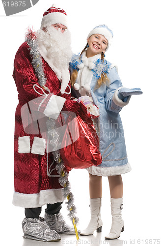Image of Santa Claus and snow maiden with stretched palm