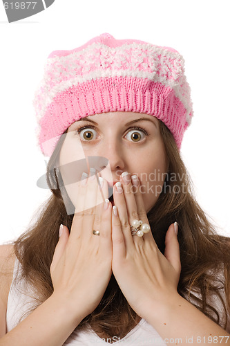 Image of surprised woman in pink hat