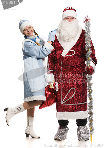 Image of Snow girl  embraces Santa