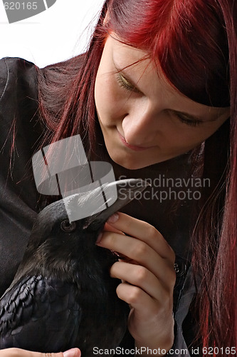 Image of young woman with raven