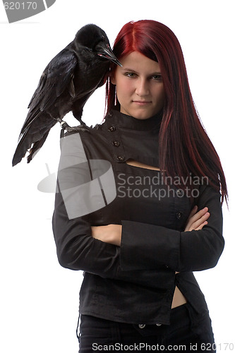 Image of young witch with raven