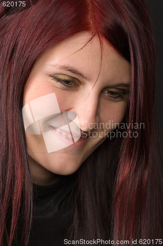 Image of smiling red-haired woman