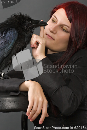 Image of woman with raven
