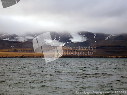 Image of yacht on waves