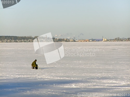 Image of winter fisherman