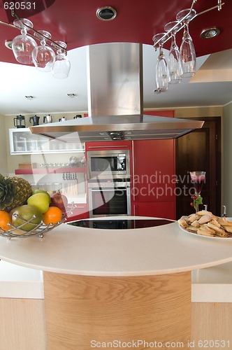 Image of Red modern kitchen. 