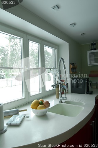 Image of Red modern kitchen.