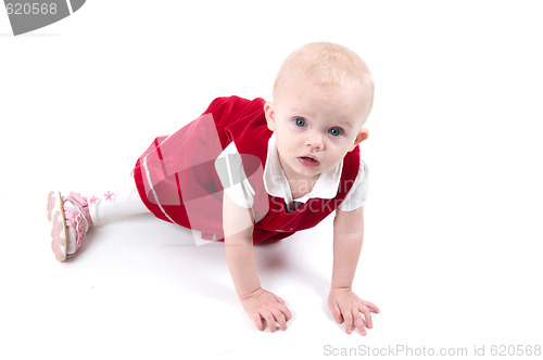 Image of Baby sitting on the floor