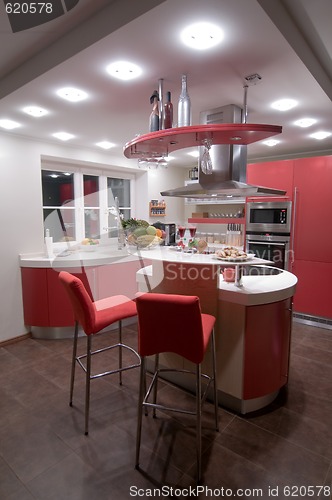 Image of Red modern kitchen.