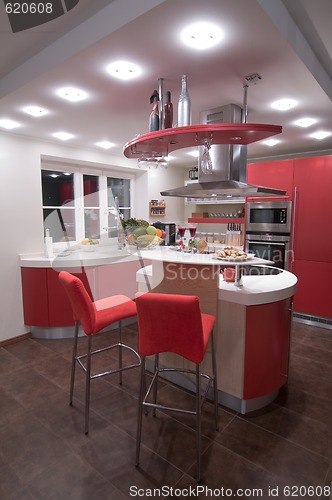 Image of Red modern kitchen.