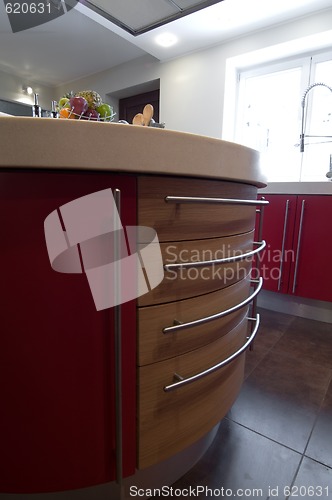 Image of Red modern kitchen. 