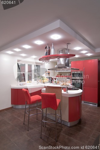 Image of Red modern kitchen.