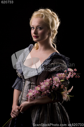 Image of Beautiful woman with flowers on black background