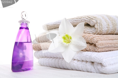 Image of aromatic oil and towel