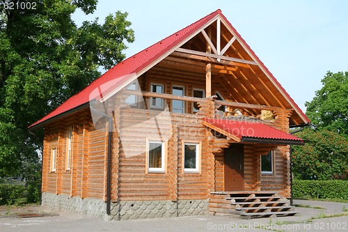 Image of house with red roof