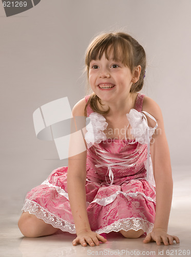 Image of Beautiful little girl in pink dress