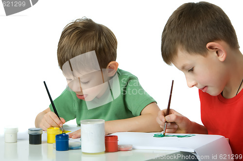 Image of Two boys draw  gouache