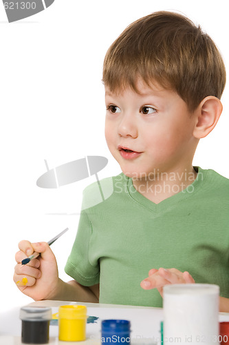 Image of boy with paints