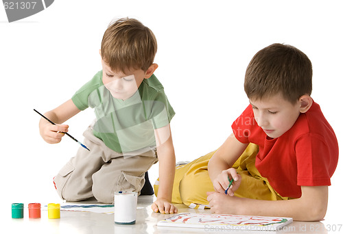 Image of two boys drow on floor