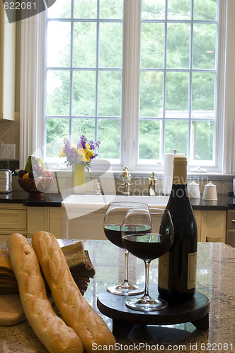 Image of kitchen island with wine baguettes