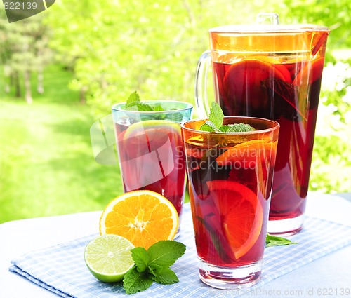 Image of Fruit punch in pitcher and glasses