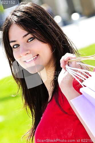 Image of Young woman shopping