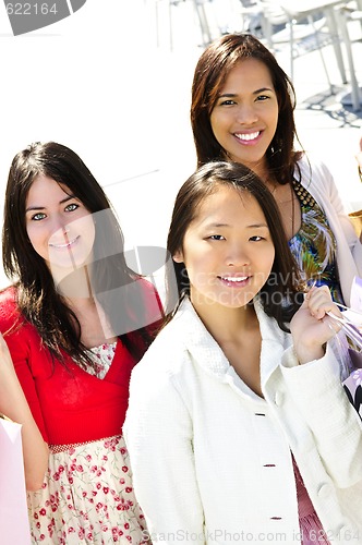 Image of Young girlfriends shopping