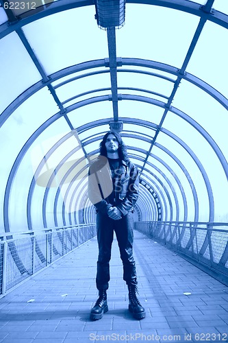 Image of man in blue tunnel