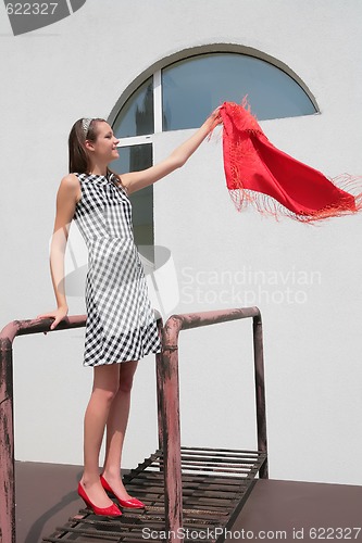 Image of girl with red kerchief