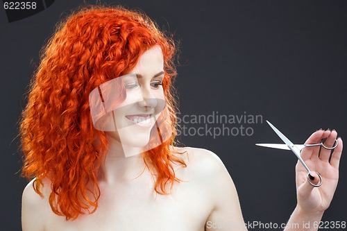 Image of redhead with scissors